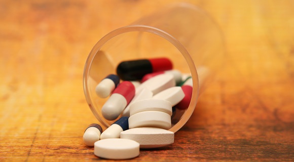 Pills on grunge background